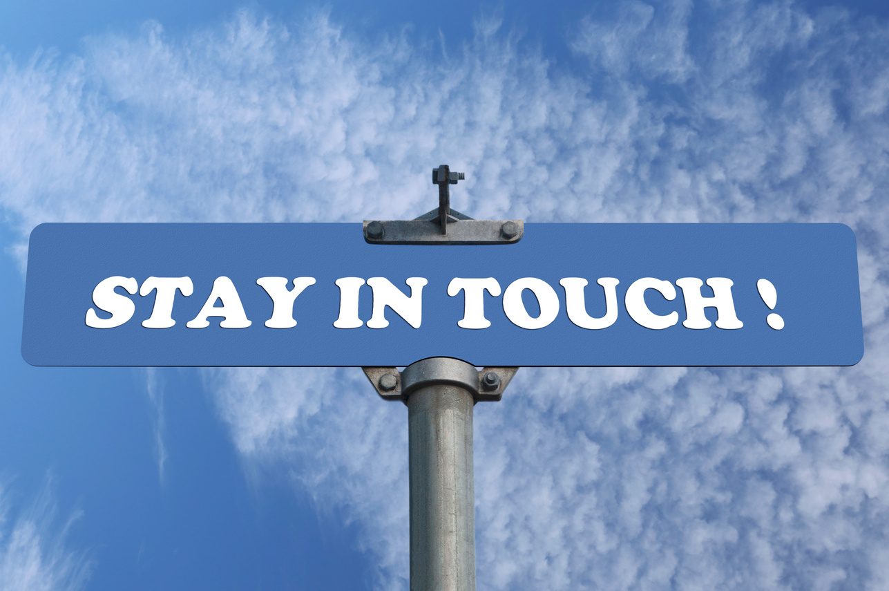 Stay in touch road sign